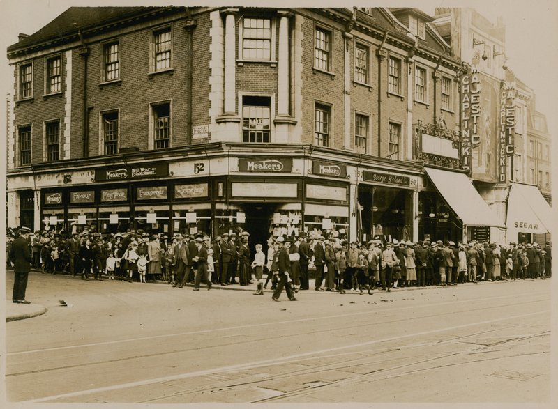 Queue for Charlie Chaplin in The Kid at The Majestic, High Street, Clapham, circa 1921 by English Photographer