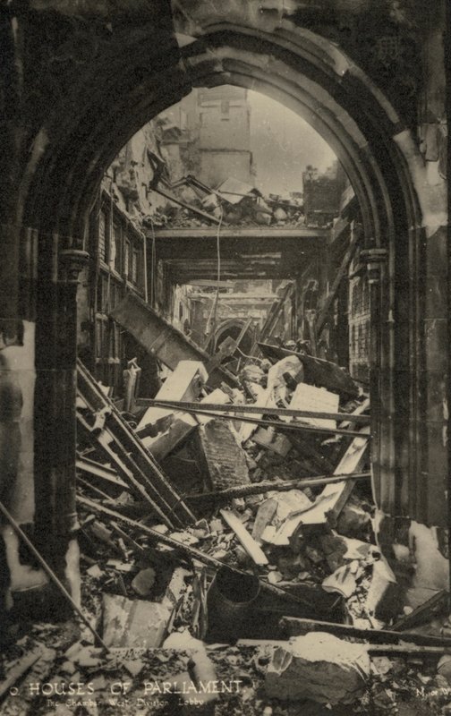 The Houses of Parliament, London, showing bomb damage during WW2 by English Photographer