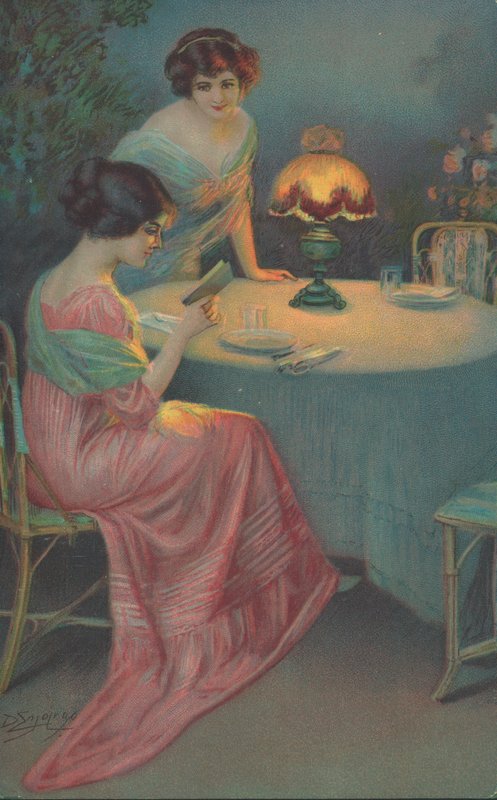Two women sitting at a table by English School