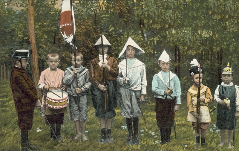 Group of boys playing soldiers by European Photographer