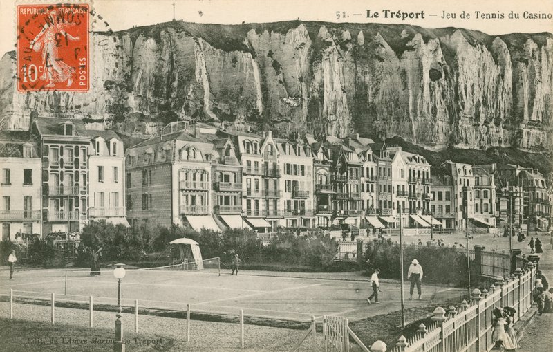 A game of tennis in the seaside town of Le Treport by French Photographer