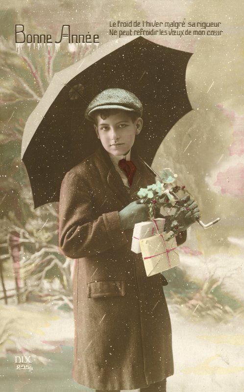 Handsome, well-dressed boy, standing in snow with umbrella by French Photographer