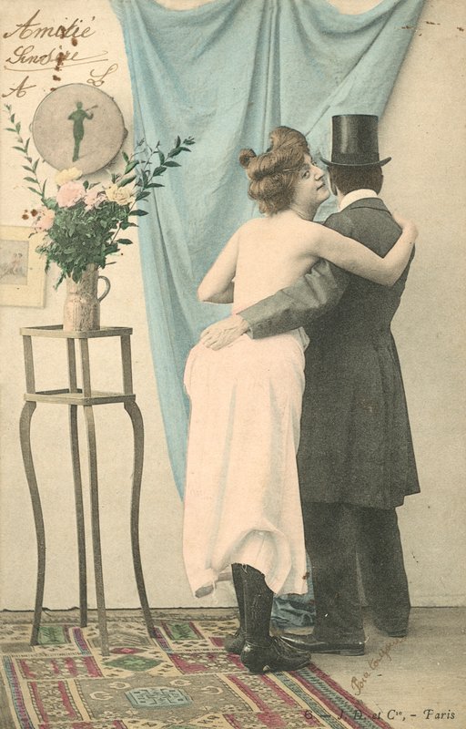 Man in Top Hat with Arm Around Half-Dressed Woman by French Photographer