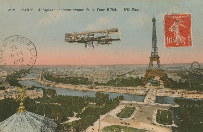Aeroplane circling around the Eiffel Tower (hand-coloured photo) by French Photographer