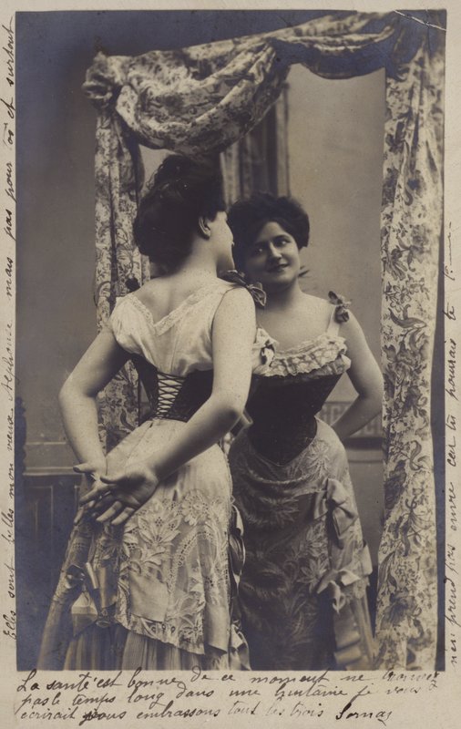 Pretty Girl Admiring Herself in the Mirror by French Photographer