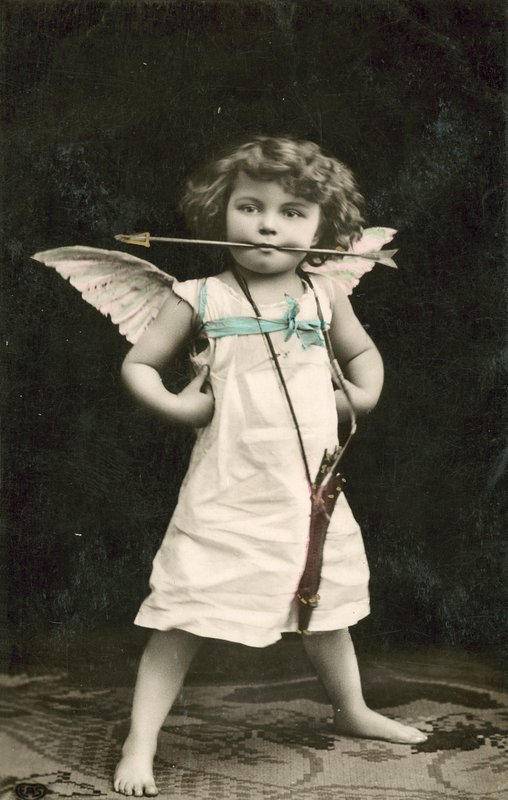 Small Boy, Dressed as Cupid, with an Arrow in His Mouth by French Photographer