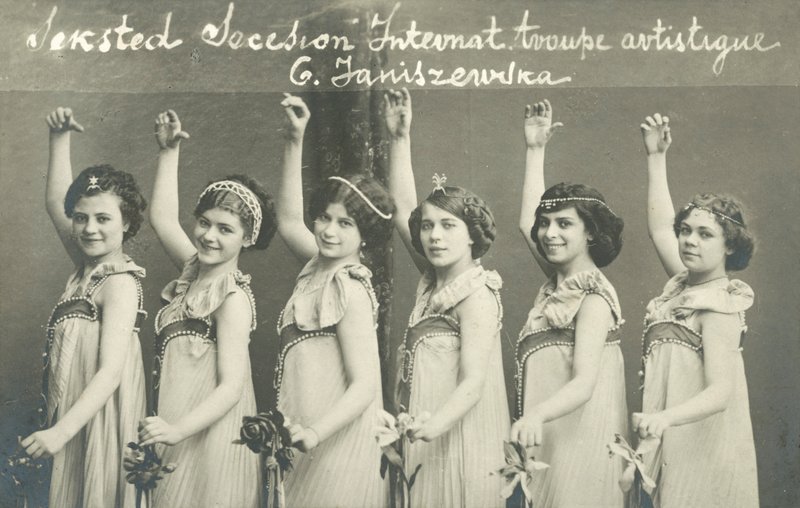 Troupe of young female dancers, smiling by French Photographer