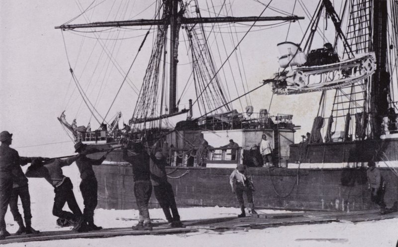 The motor sledges were unpacked and landed by Herbert Ponting