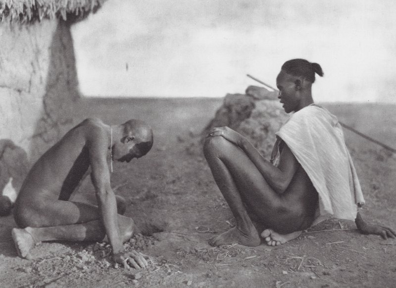 Africa: Medicine-man bleeding a patient by Hugo Adolf Bernatzik