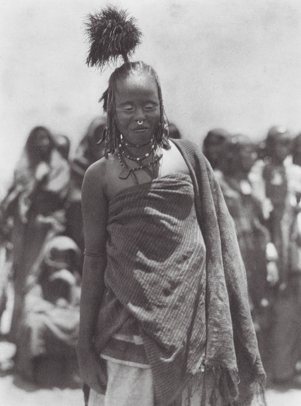 Africa: Ostrich-feather head-dress worn by the Aulad Hamids by Hugo Adolf Bernatzik