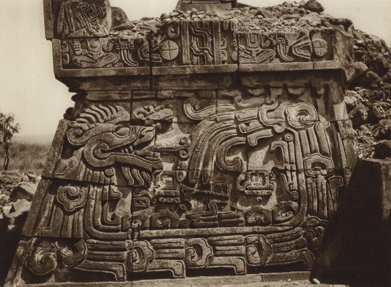 Mexico: Xochicalco, Part of the pyramid with serpent and hieroglyphs by Hugo Brehme