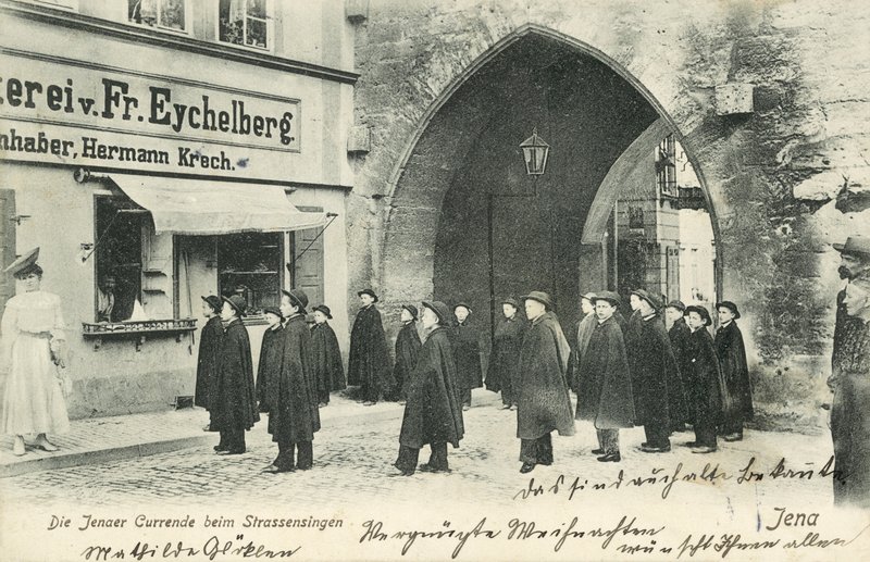Student choir singing on the streets of Jena, Germany by Photographer German