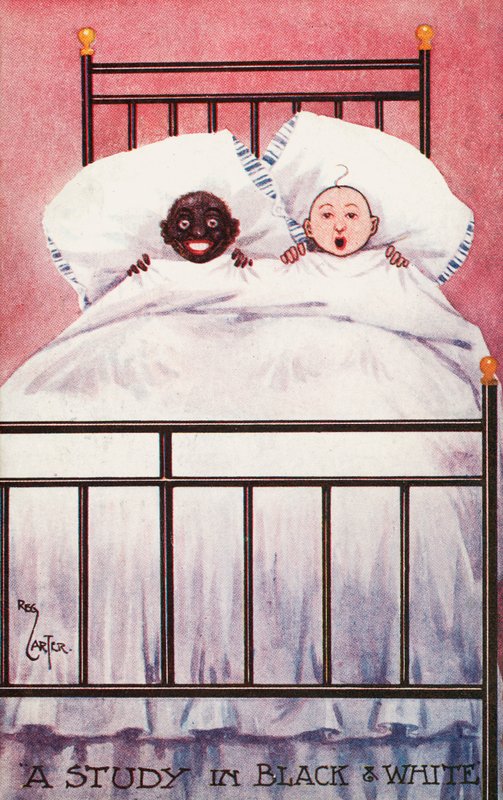 Black and white children in a bed by Reg Carter