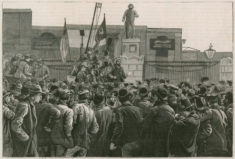 The Great Strike of Dock Labourers at the East End: Mr John Burns addressing the men on strike at the gates of the East and West India Docks by Robert Barnes