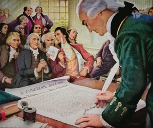 John Hancock (1737-93) signs the American Declaration of Independence, 4th July 1776