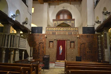Interior of Abo Serga Church in Old Cairo, historic Coptic Orthodox church with icons and wooden iconostasis