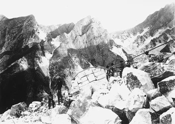 Some excavators in the Apuan Alps participate in the 