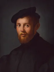 Portrait of a young man with a book