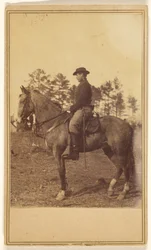 Man Wearing a Hat, in Profile, on Horseback