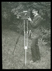 Self-Portrait with Camera, Tripod and Pistol