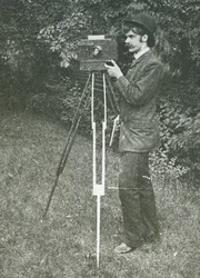 Self-Portrait with Camera, Tripod and Pistol