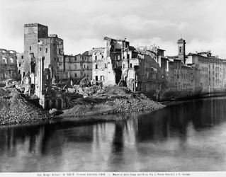 World War II: the houses along the Arno River, between the Ponte Vecchio and San Jacopo in Florence, after the bombing. This photograph was formerly part of the Brogi Collection, but now belongs to the Alinari Collection