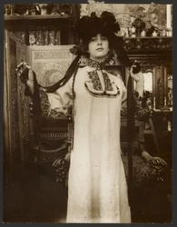 Female Model in a Long White Robe and a Hat with Ribbons, Paris