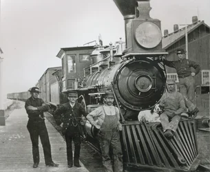A freight train of the Central Pacific railway with crew at Mill City, Nevada