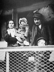 A migrant Italian family on the ferry from Ellis Island to New York City
