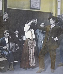 Immigrants in folk dance on Ellis Island, New York Harbor