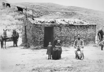 Pioneer family with their sodhouse, Nebraska