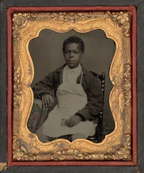 Portrait of a Boy Holding a Clay Pipe