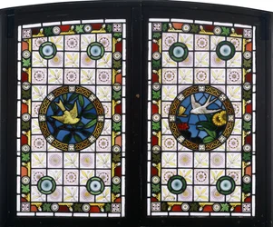 A pair of leaded glass windows, c.1890