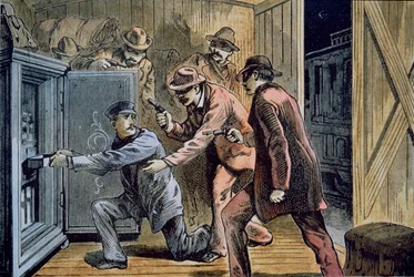 Frank and Jesse James Gang rob the express car of a train in 1879
