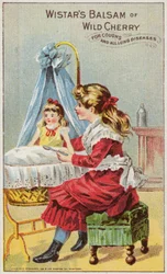 Girl Giving Medicine To Her Doll