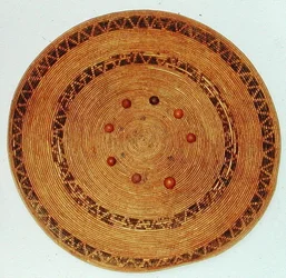 Pomo game tray with acorn dice, from California