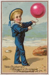 Sailor Boy Holding Red Balloon