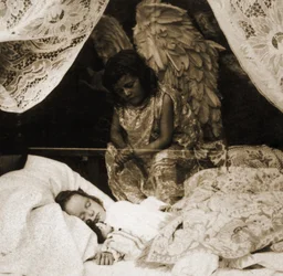 Sleeping girl being watched over by her Guardian Angel
