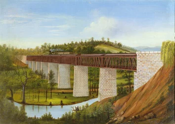 View of a covered bridge and railroad