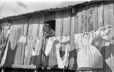 A Smile Behind the Clothes Laid Down in Crotone
