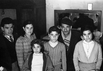 Family Group in a Basement