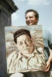 Carlo Levi Holding a Portrait of Giuseppe di Vittorio