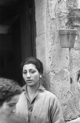 Women on the Doorstep of the House