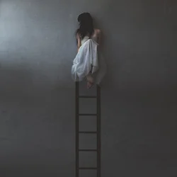 Solitary Woman On Ladder