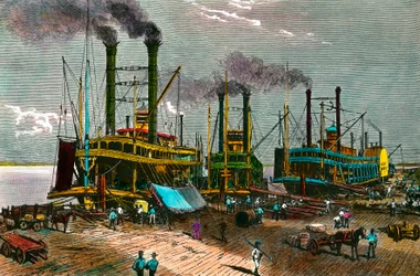 Loading cotton on steam boats on Mississippi for New Orleans. Engraving of the 19th century. Private collection