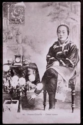 Portrait of Chinese woman in traditional costume with bound feet - Early 20th century photograph - Private collection