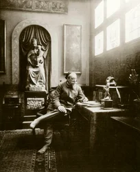 Portrait of the French writer Anatole France in 1904 in his office. Private Collection