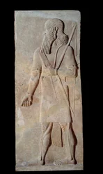 Warrior in arms from the court of King Sargon II of Assyria
