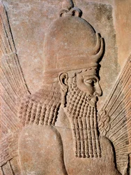 (Detail) of an alabaster relief representing a protective winged Genie, from Palace of Sargon II (Dur Sharrukin), king of Assyria in Khorsabad, Iraq. 722-705 BC