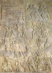 Relief depicting porters bringing wood to the coast for transportation by sea from the Palace of Sargon II, Khorsabad, Iraq